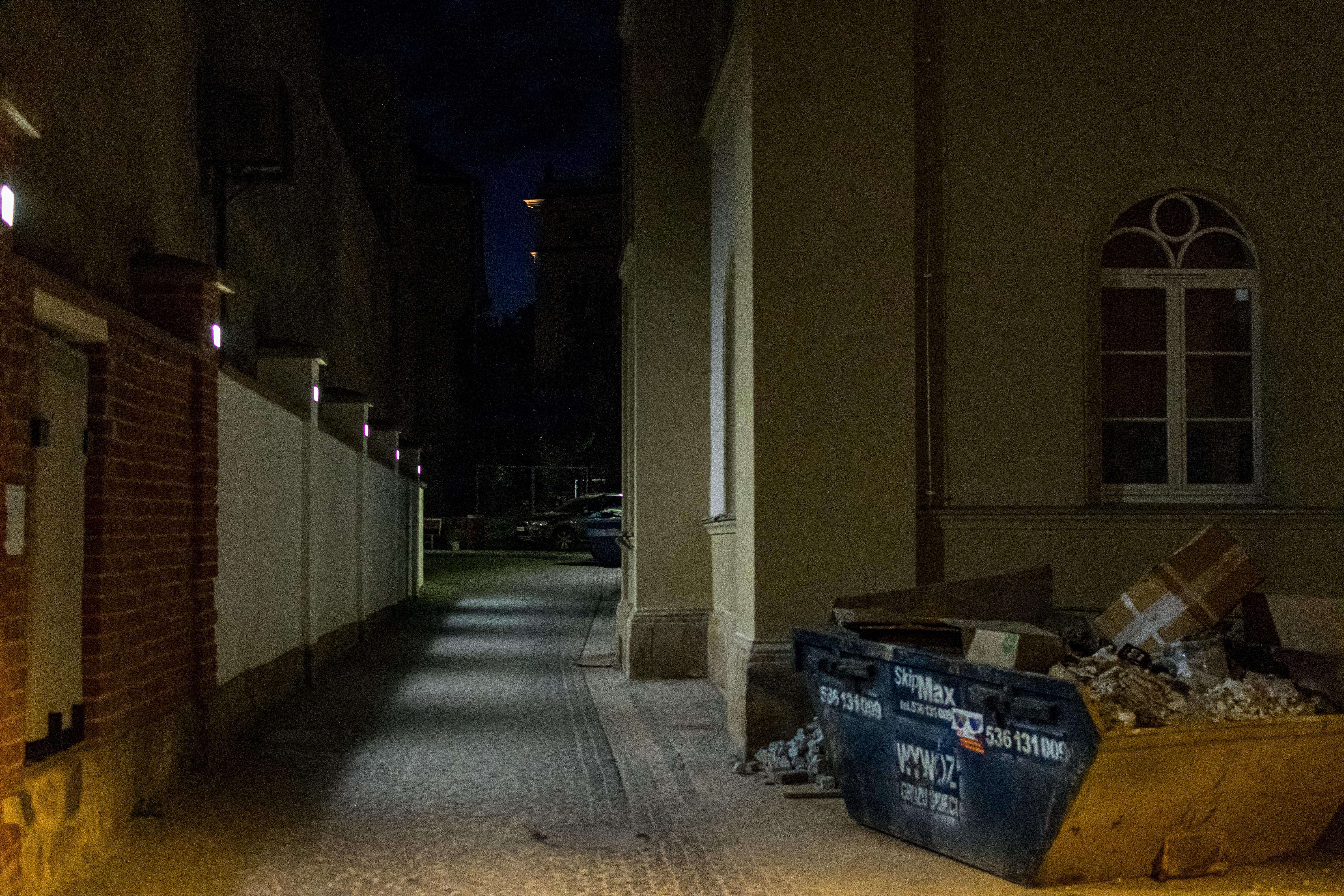 side street with some container at the side