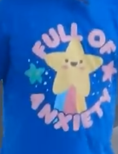 a smiling, sparkly star on a blue background with the circular text "full of anxiety"