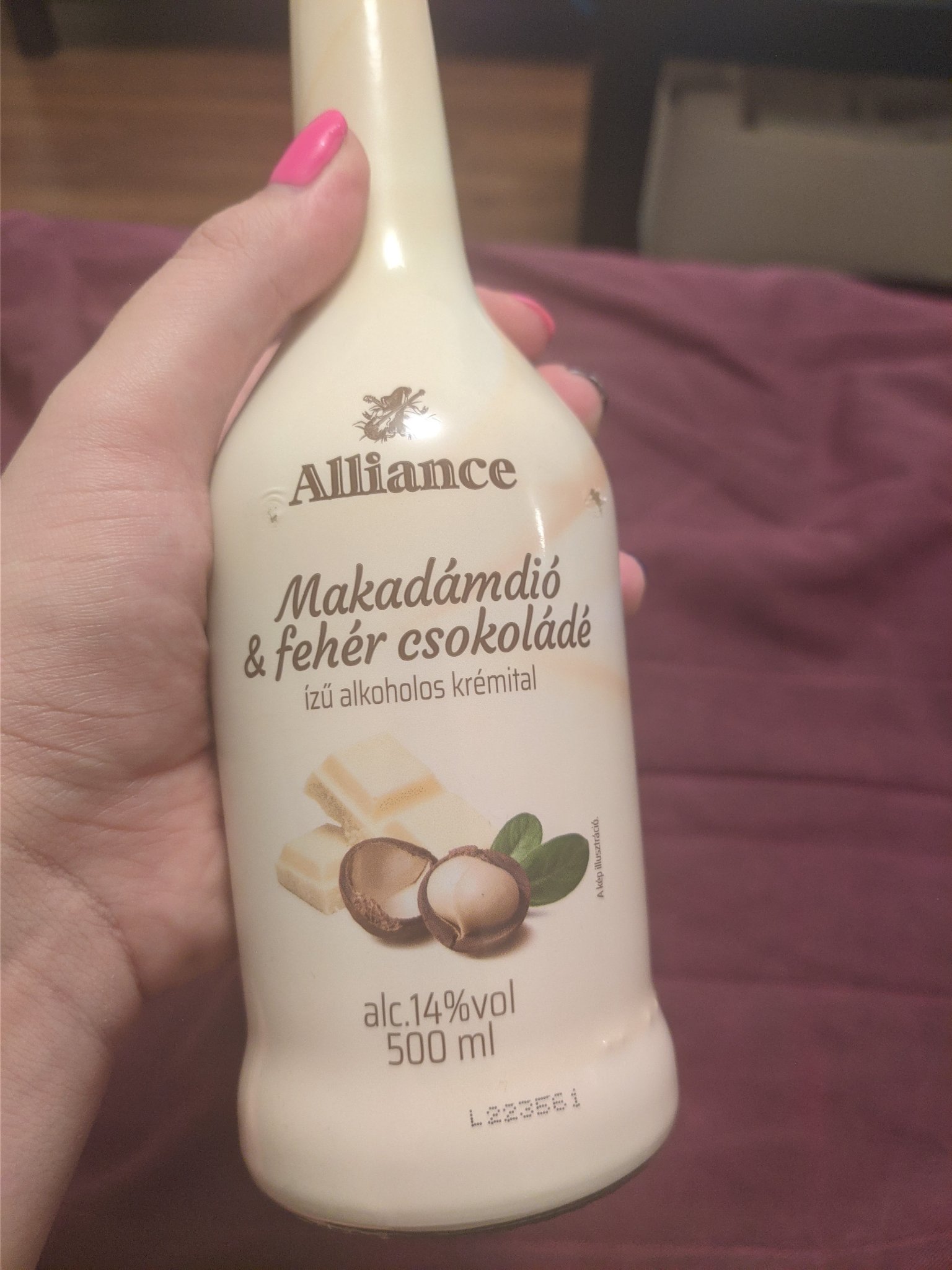bottle of sweet creamy alcoholic drink with a white chocolate and walnut flavour and 14% alcohol