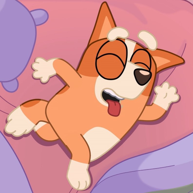 bingo is sleeping on her side, arms and legs very much spread, tongues out.