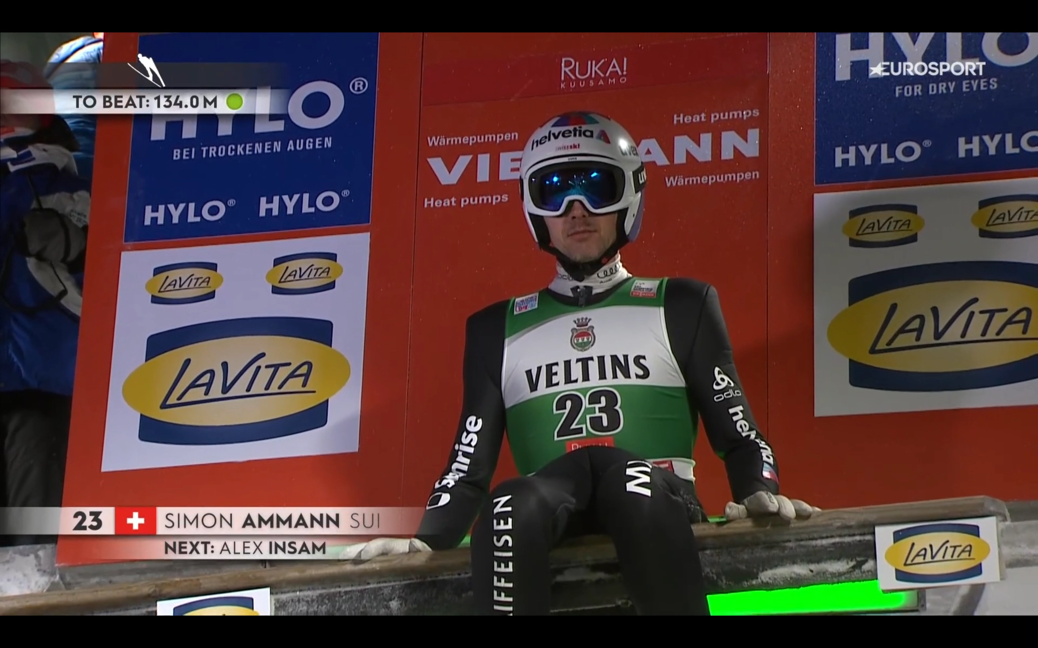 photo of Simon Ammann preparing to do a ski jump