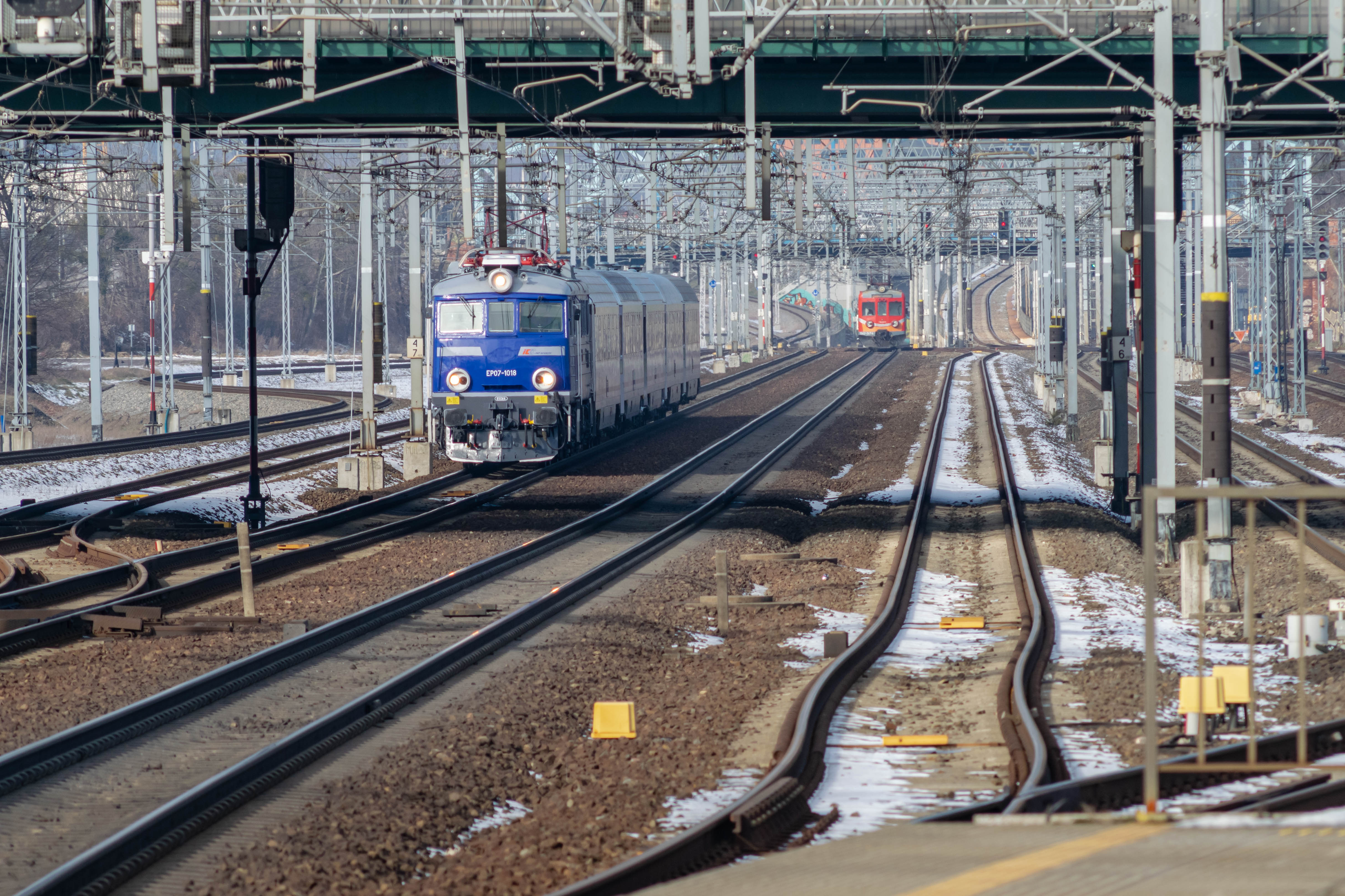 blue locomotive pulling a train