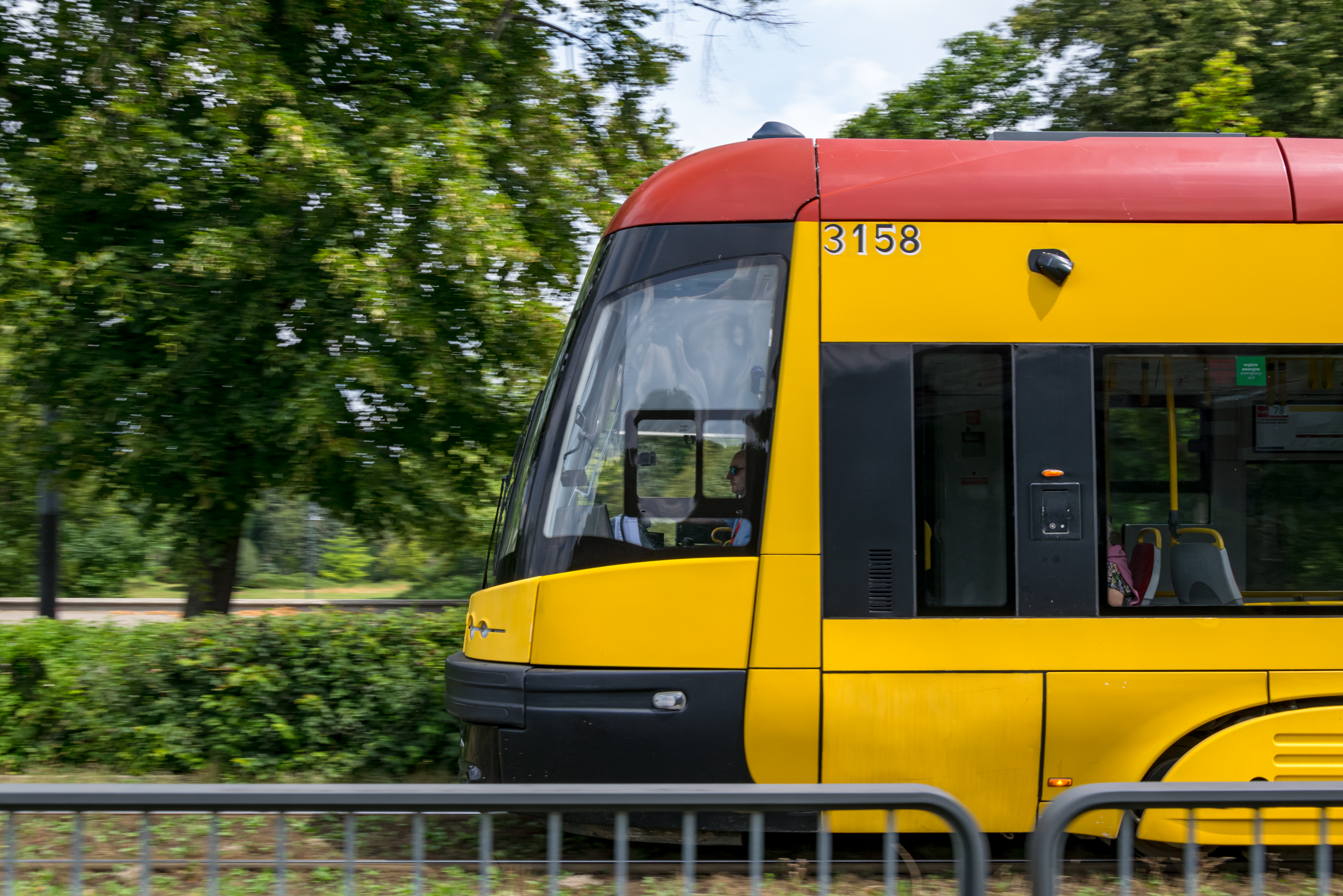 yellow-red tram speeding