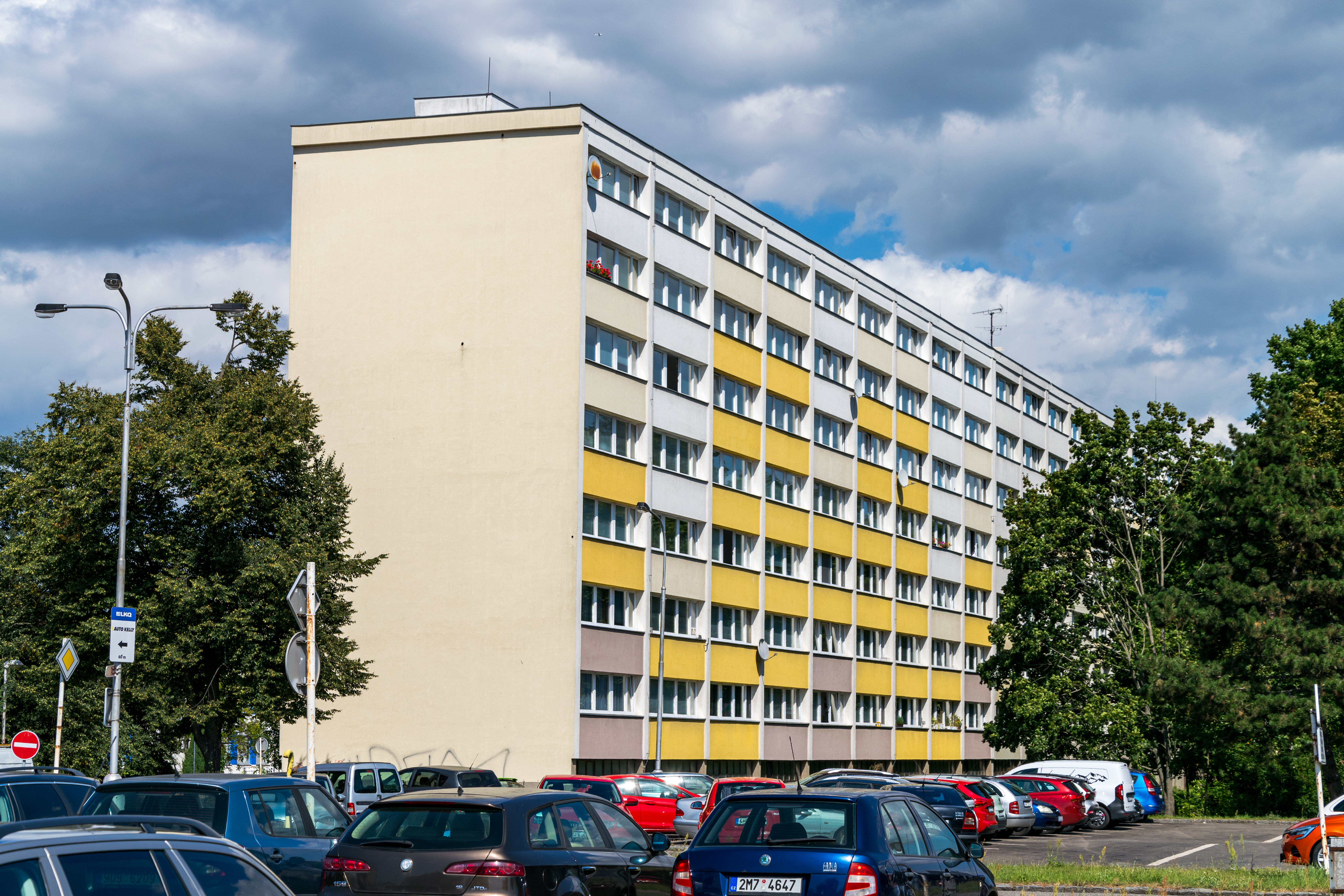 commie block with alternating yellow, white and brown panels