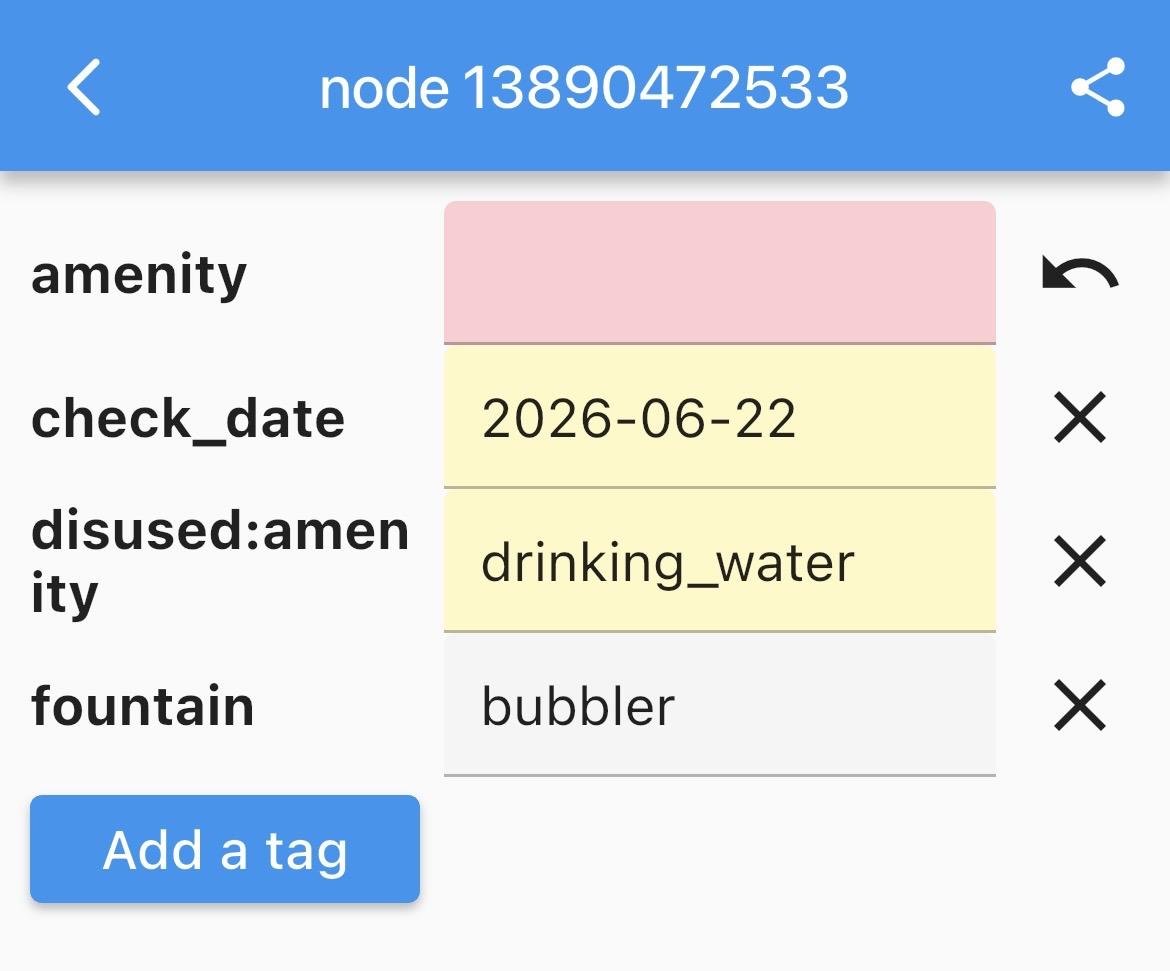 OpenStreetMap node being changed from “amenity: drinking water” to “disused amenity”, with a check date being set to today