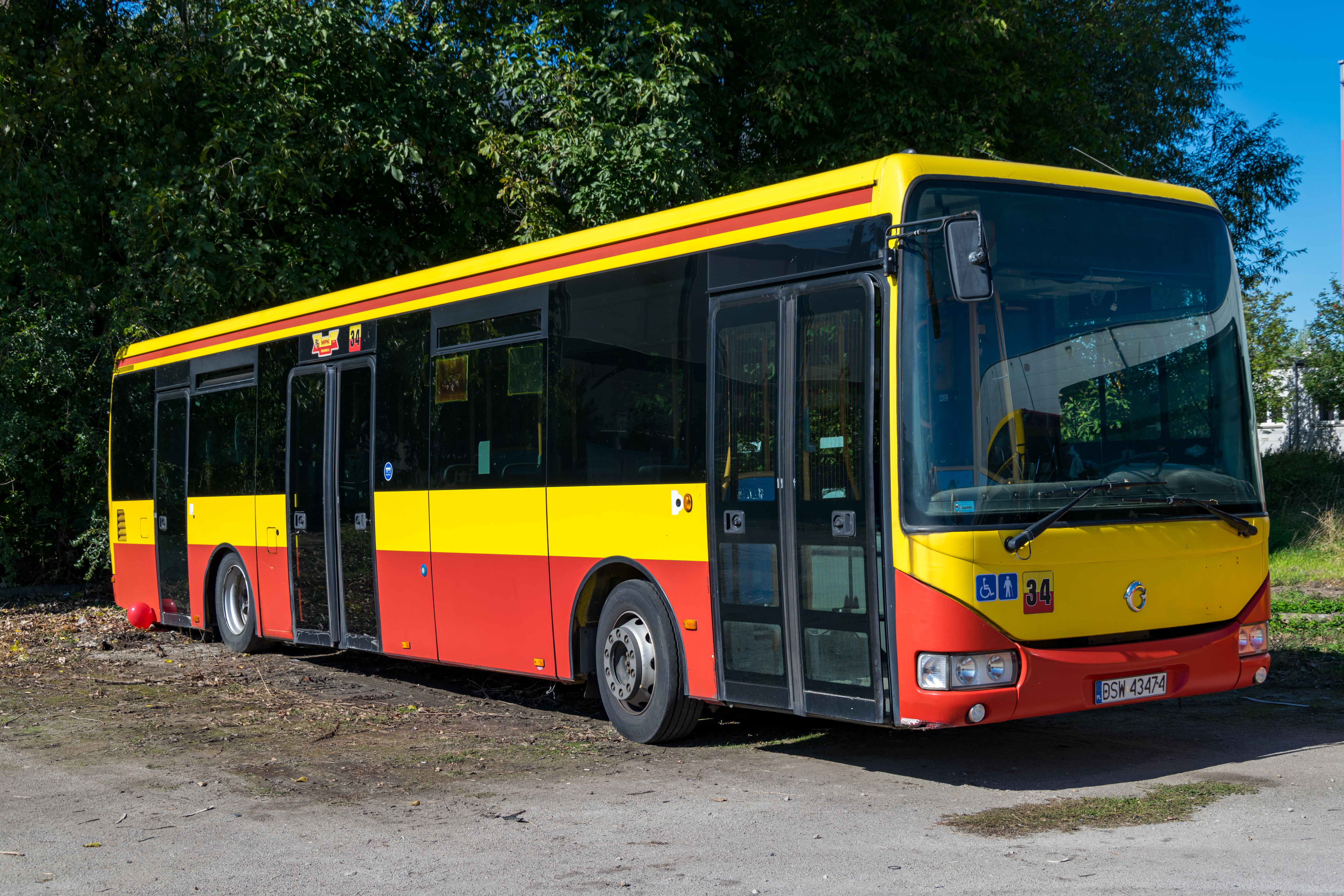 Retiring yellow-red Irisbus Crossway LE bus, already lacking displays and with half-open doors