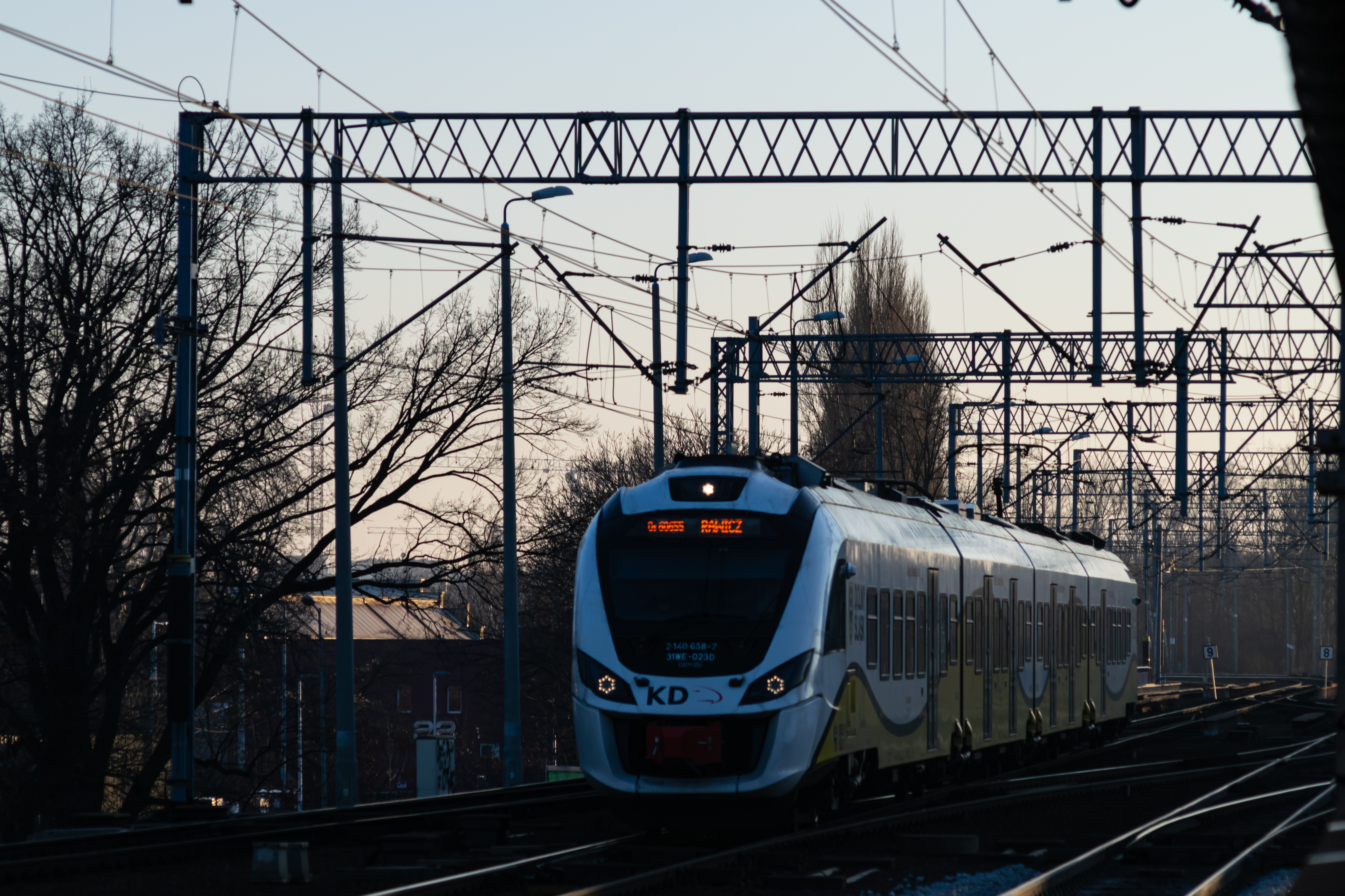 yellow-white 31WE arriving at the station