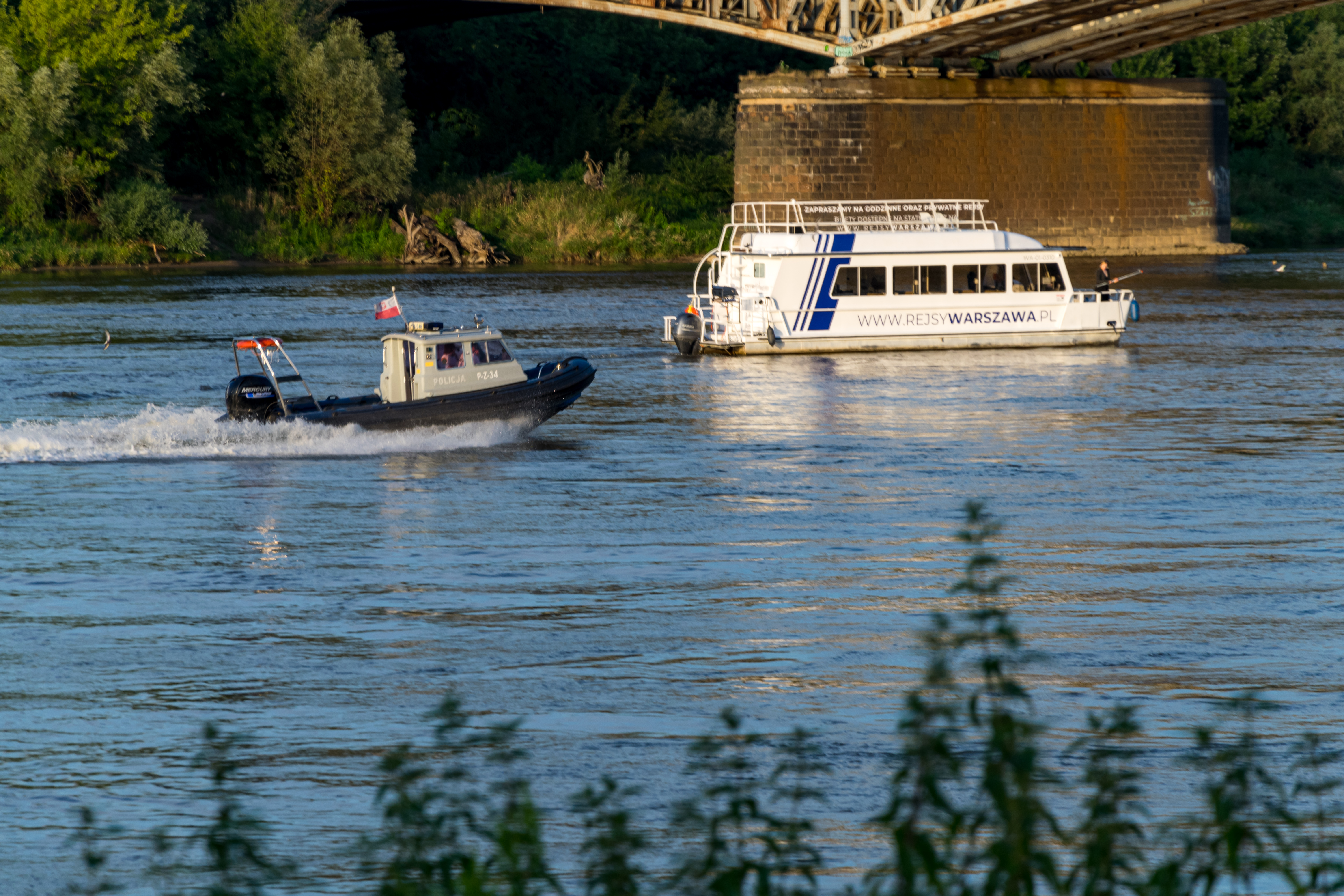 cop speedboat and some other boat