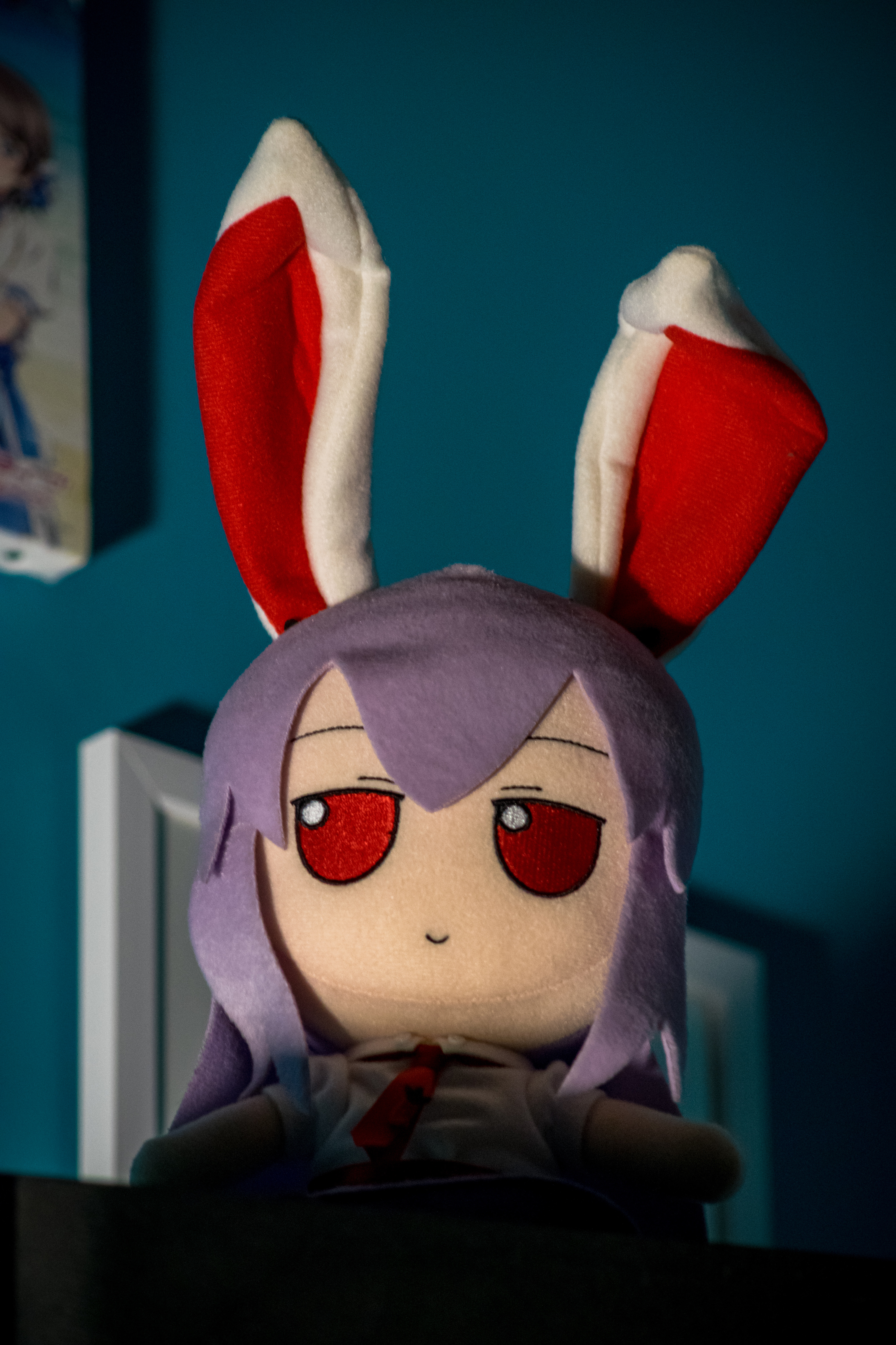 rabbit girl fumo plushie looking at you from above