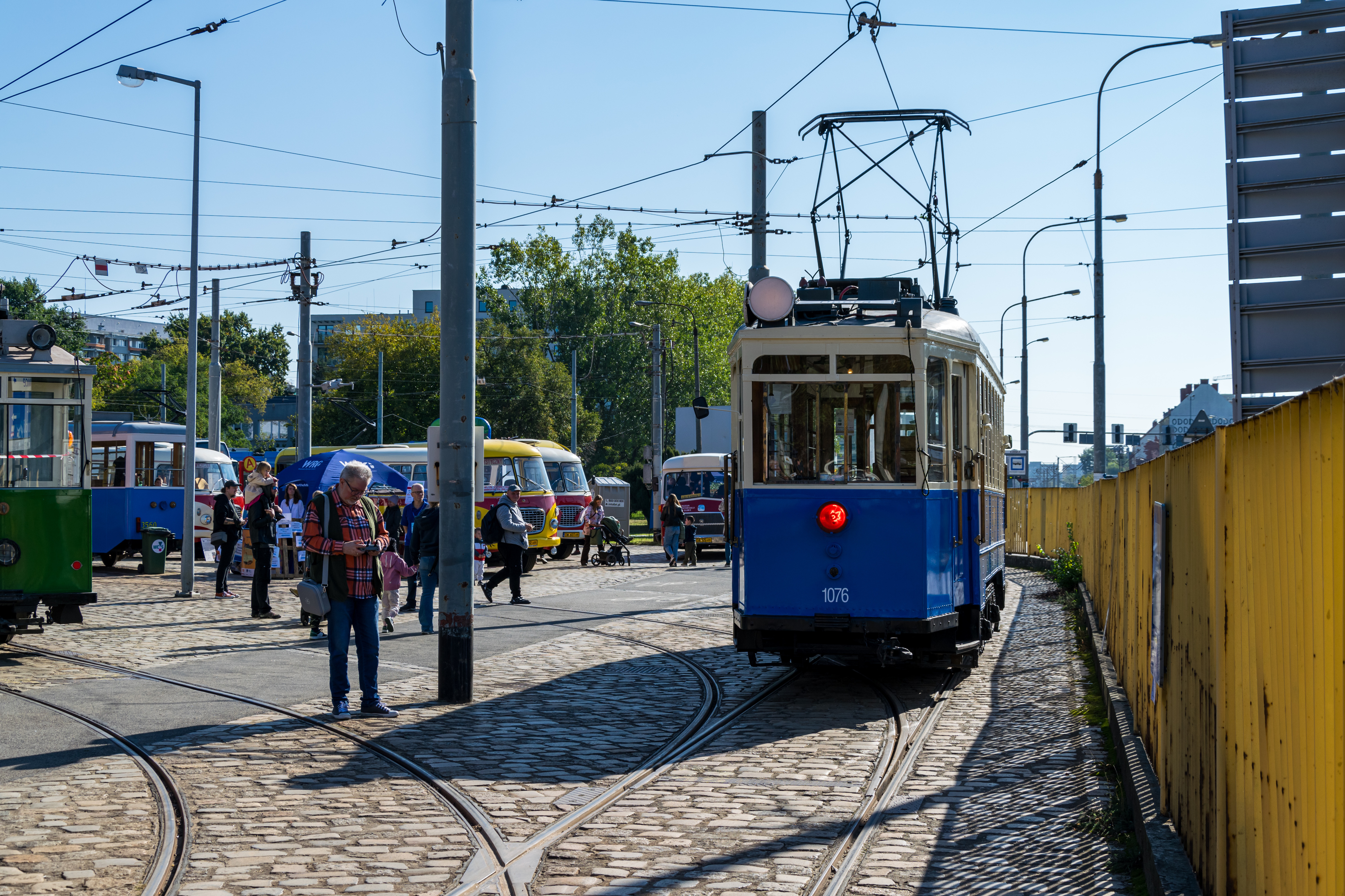 White-blue LH Standard tram waiting for departure