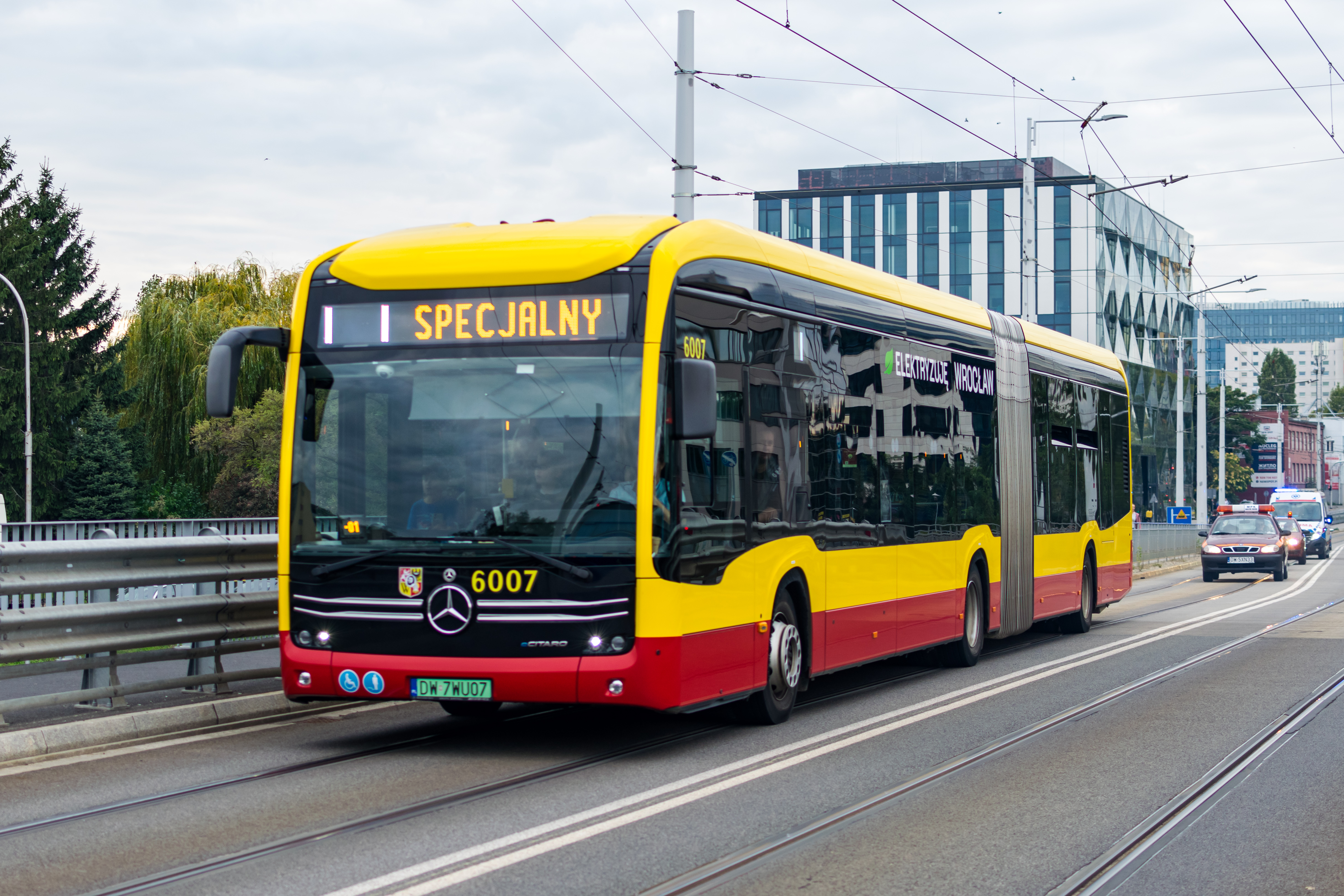 Yellow-red articulated eCitaro, very historic bus, manufactured in 2023