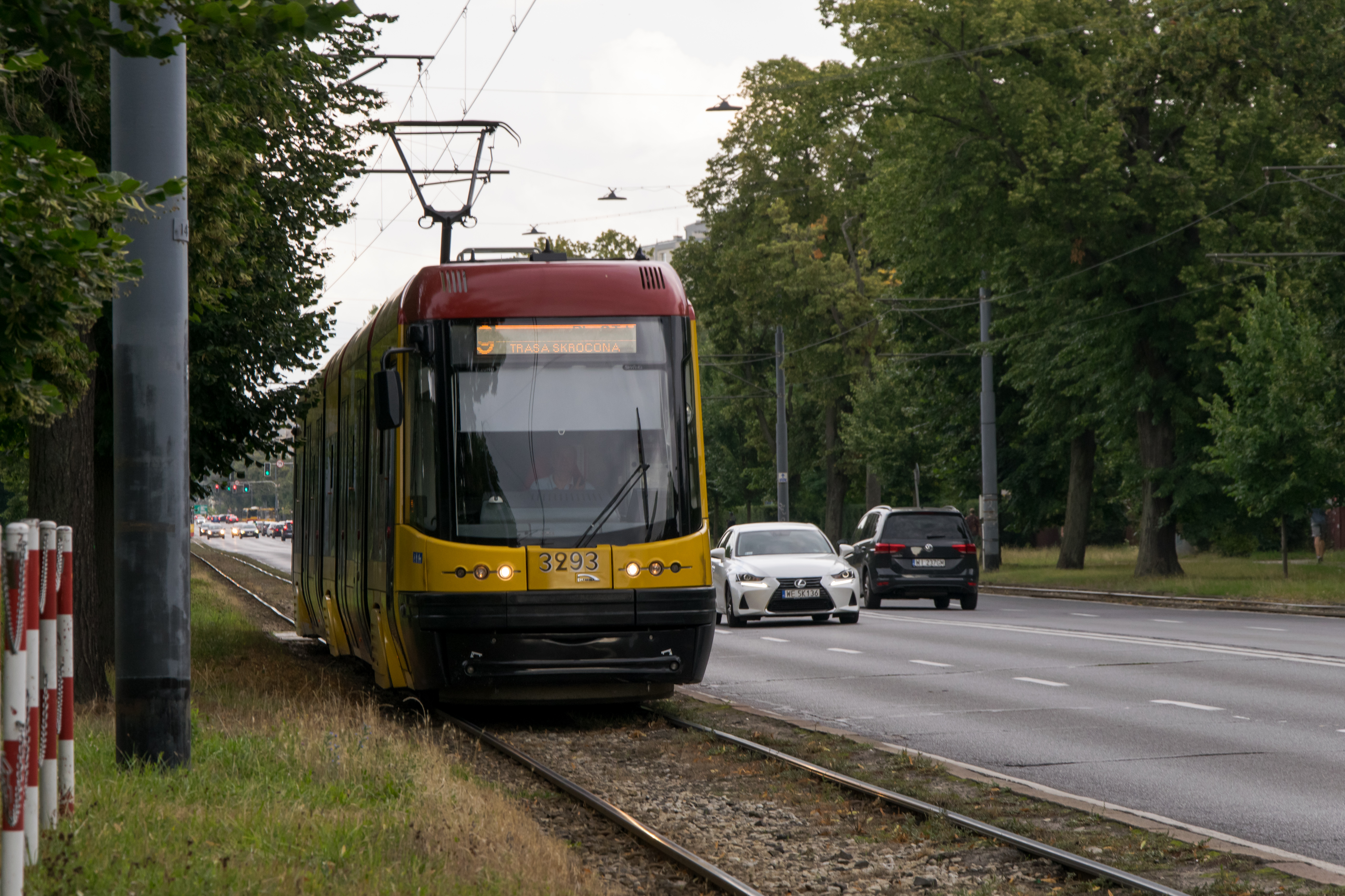yellow-red Pesa Swing tram