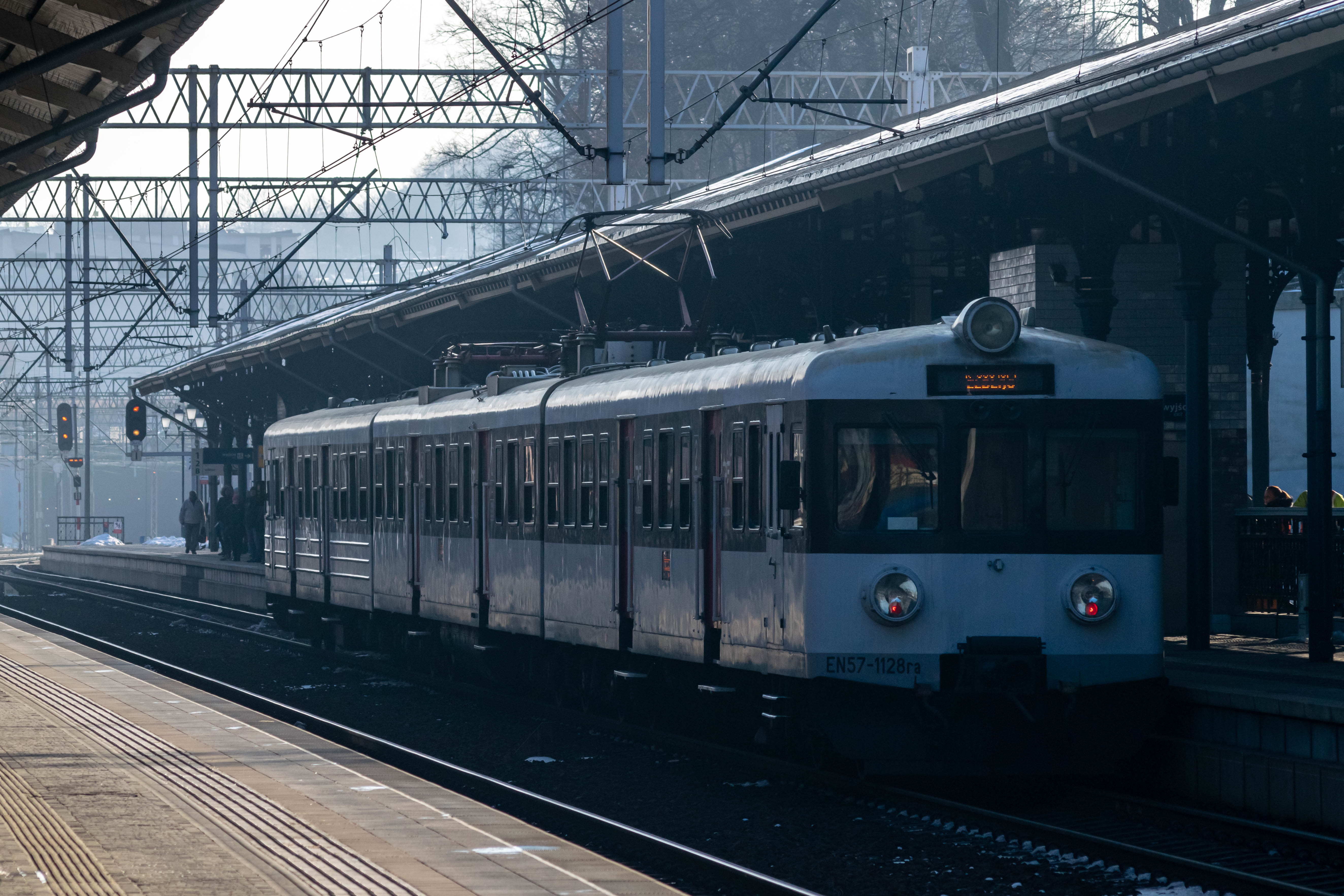 white-black old train with a slightly differring first carriage