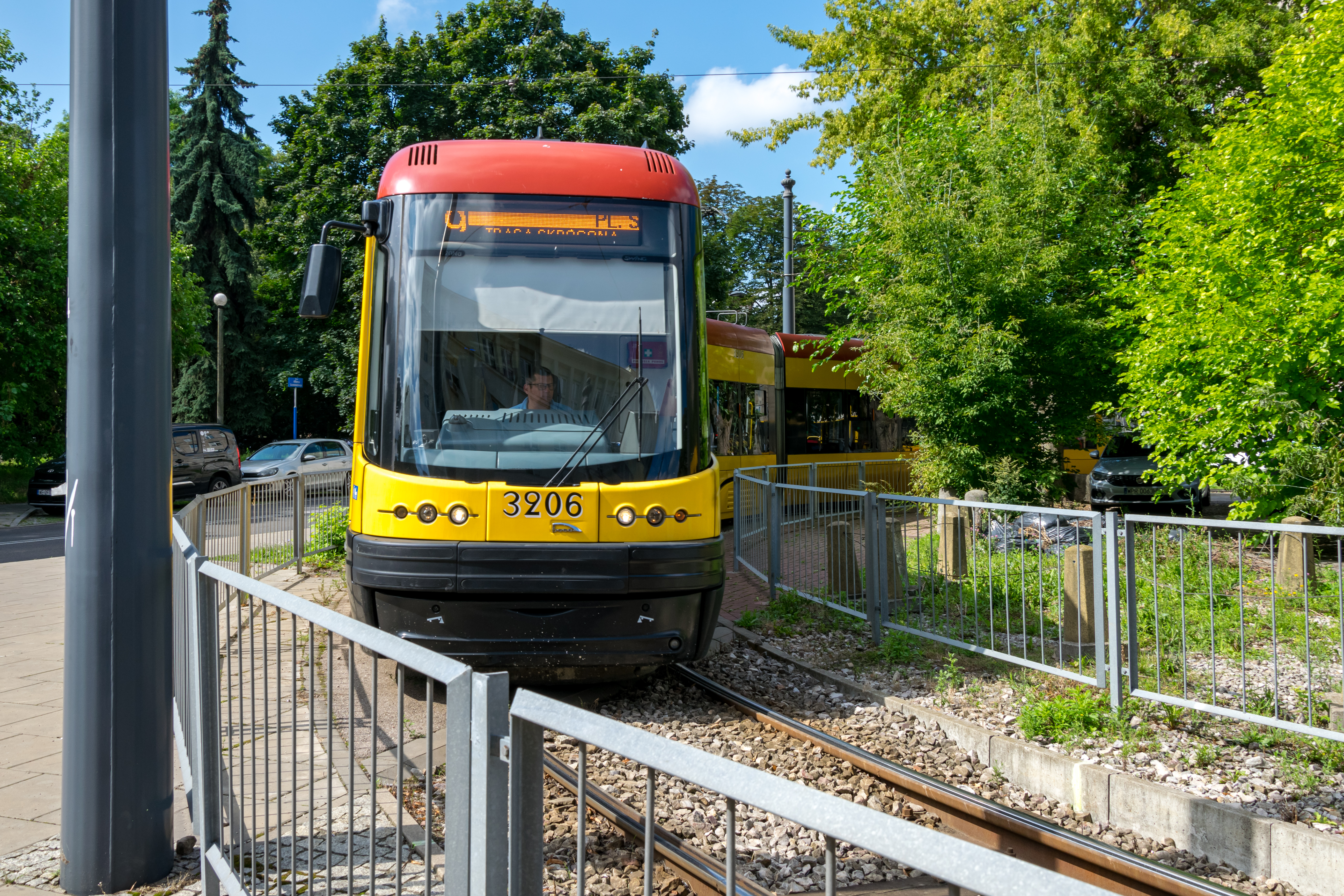 yellow-red tram is turning yeaay
