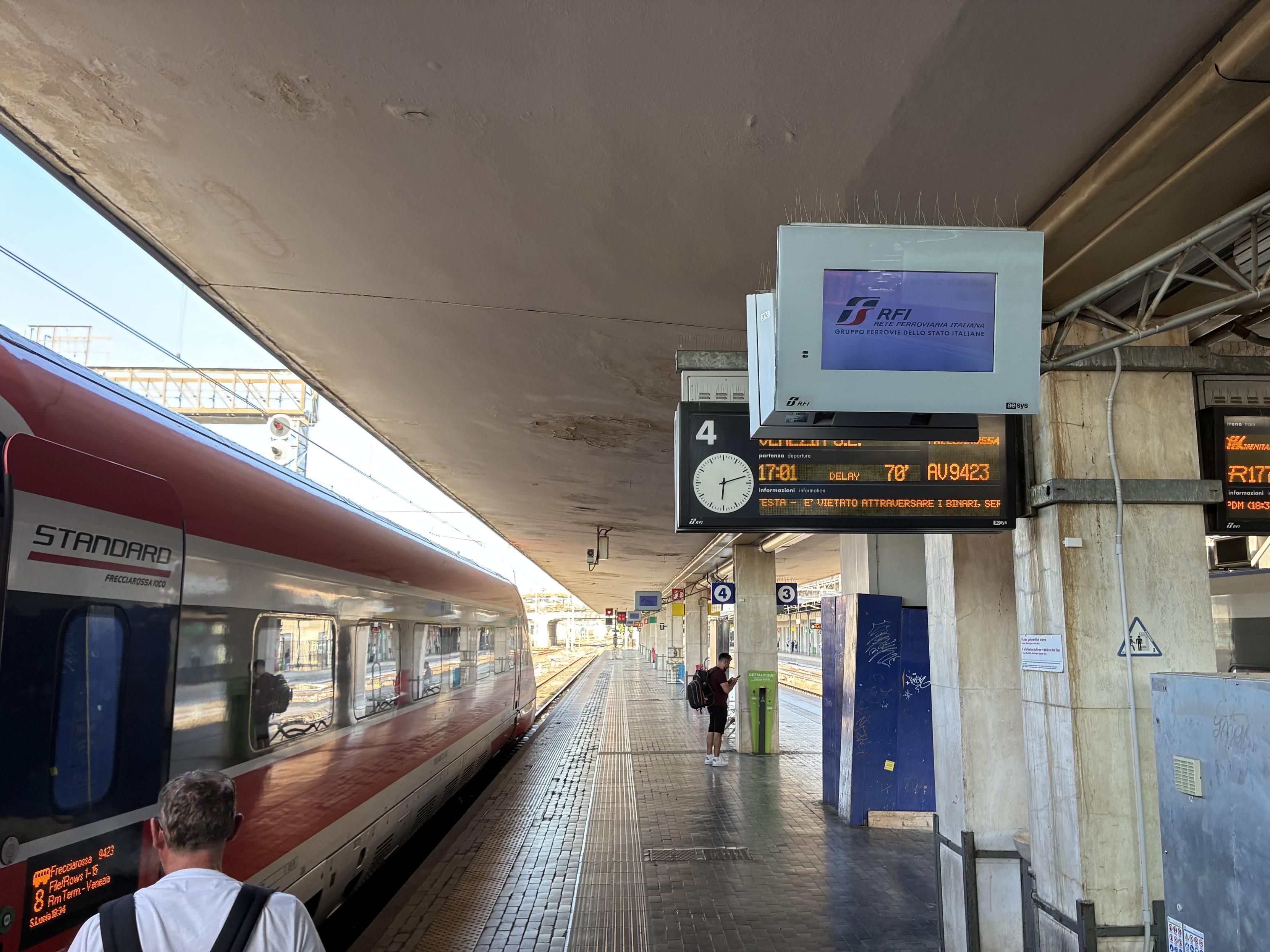 the train, parked on platform 4 with its doors open, at the exact same time the screenshot was taken
