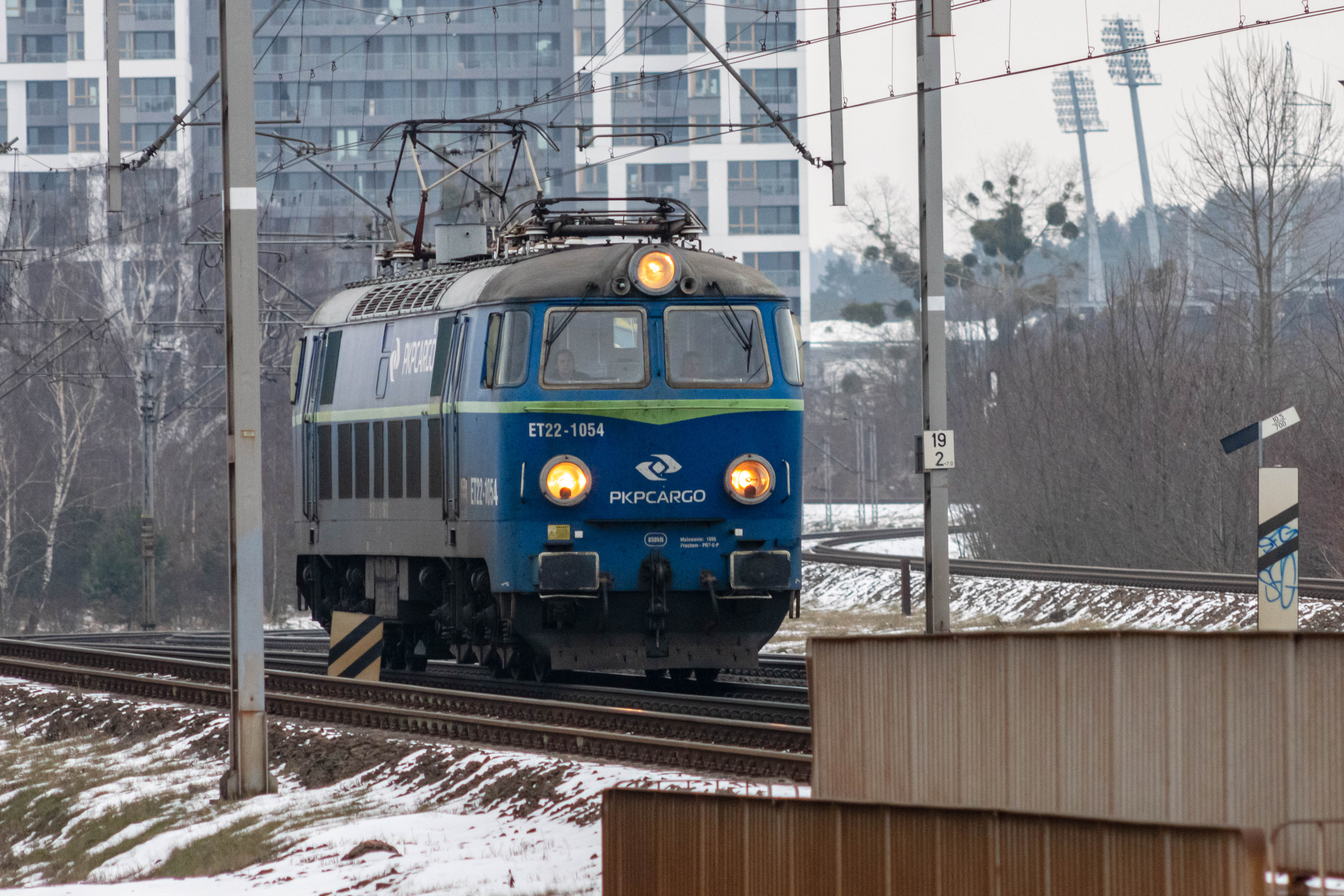 blue locomotive with green accents