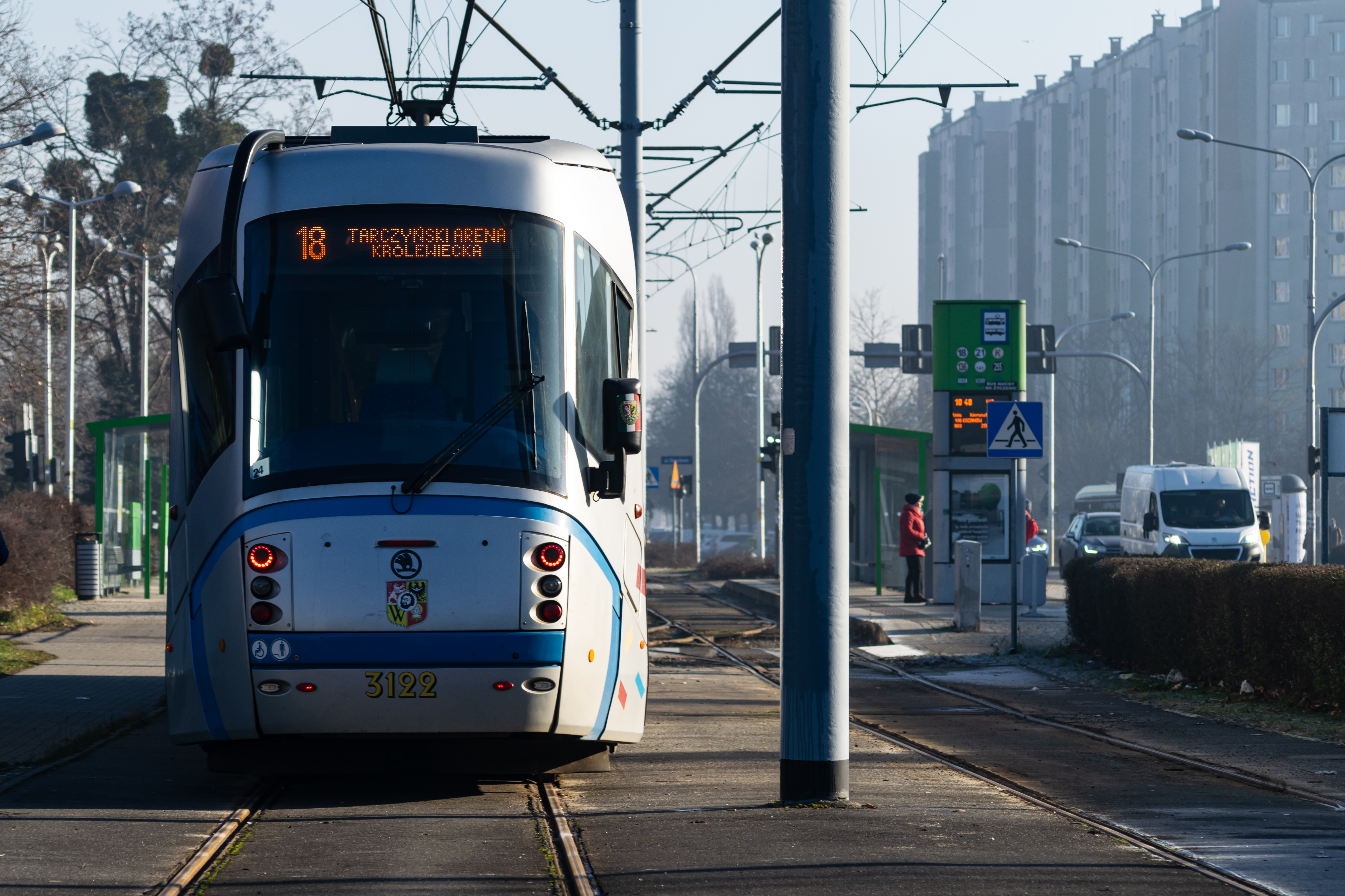 silver-blue tram stopped at terminus