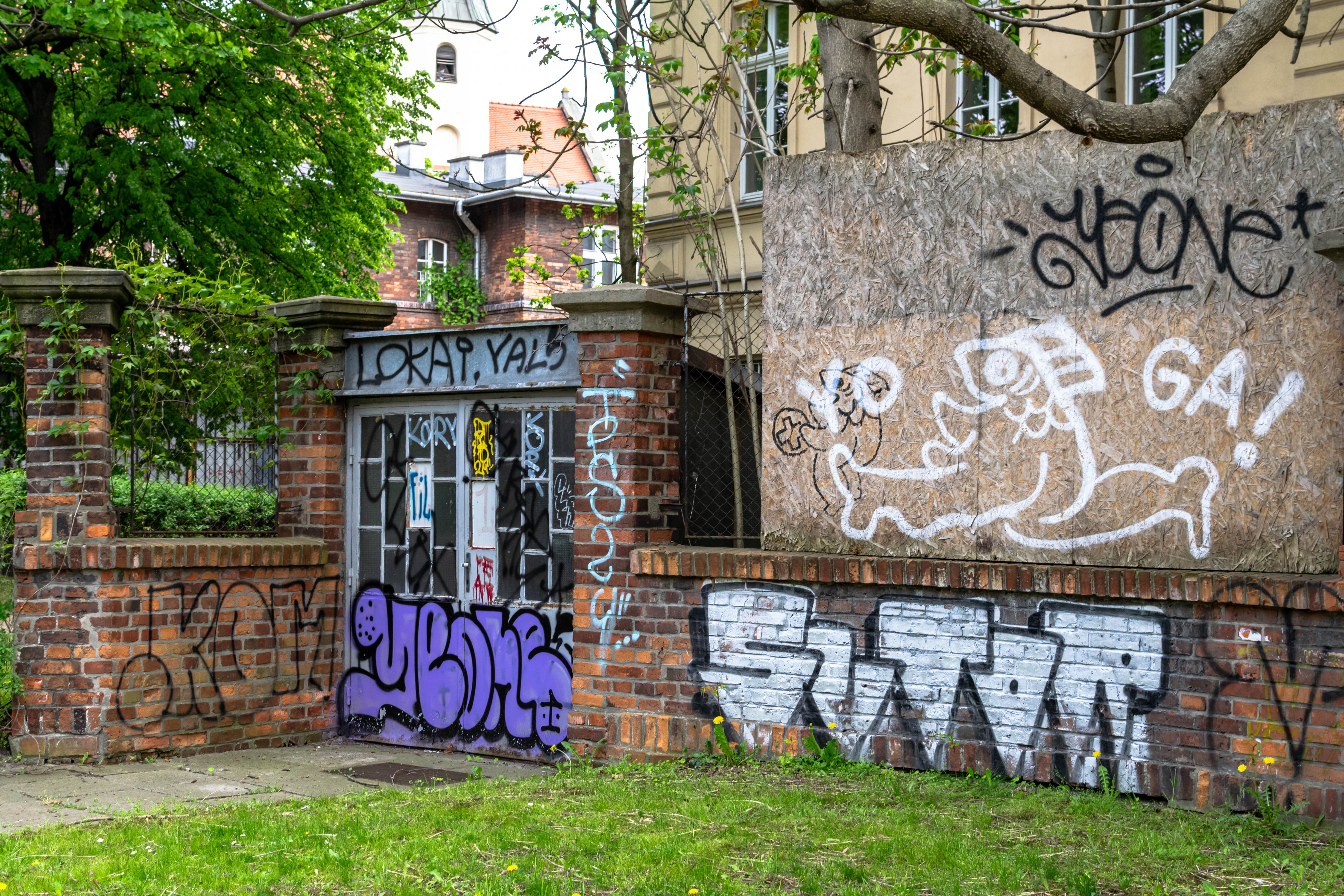 A gate? Or something?? Walls are filled to the brim with graffiti