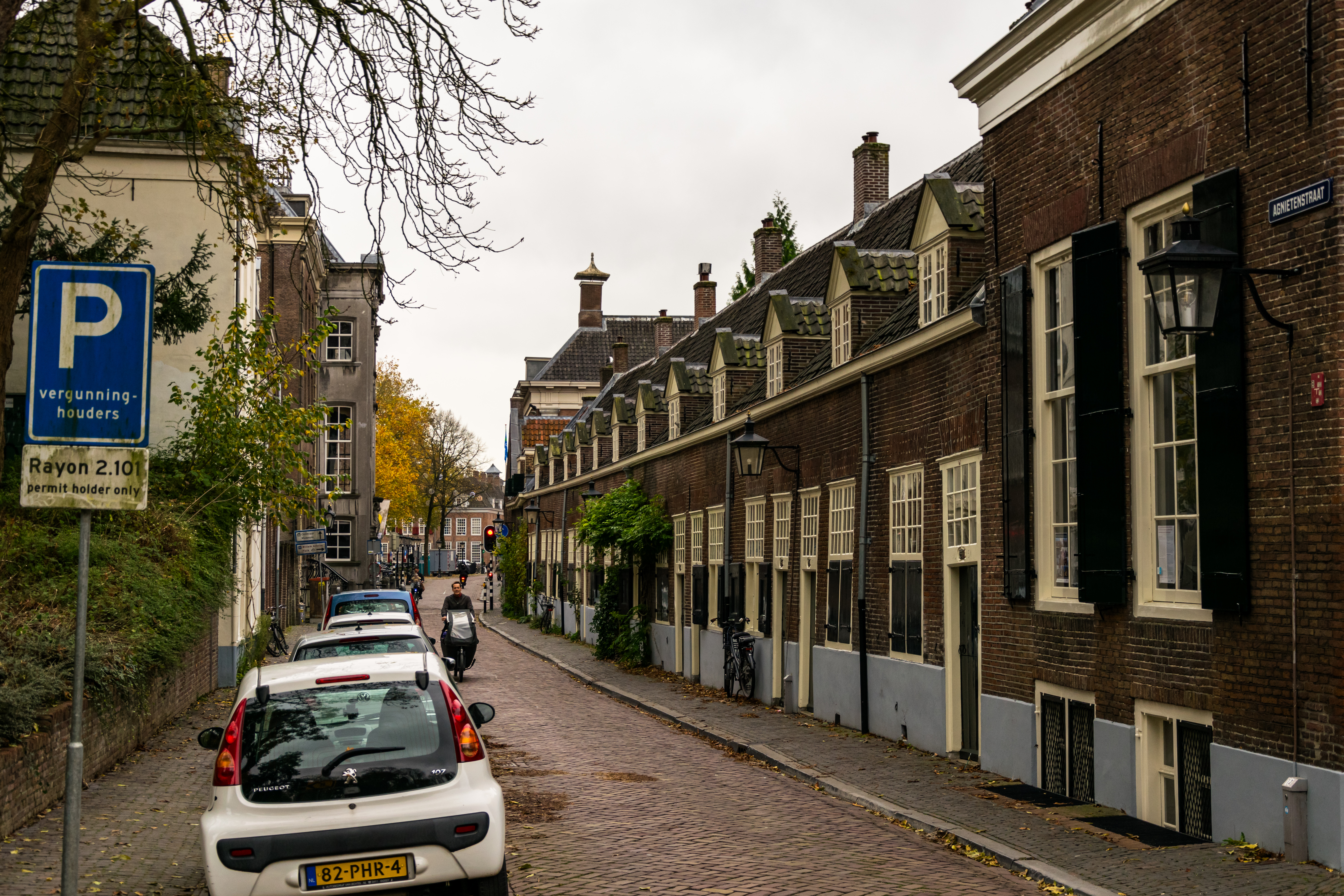another narrow residential street with even more brick buildings