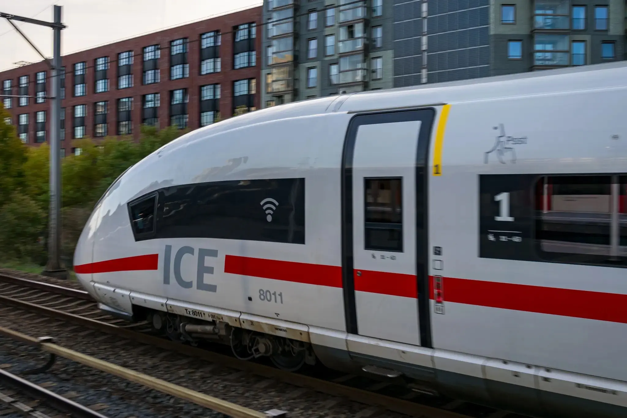 White-red high speed train passing by