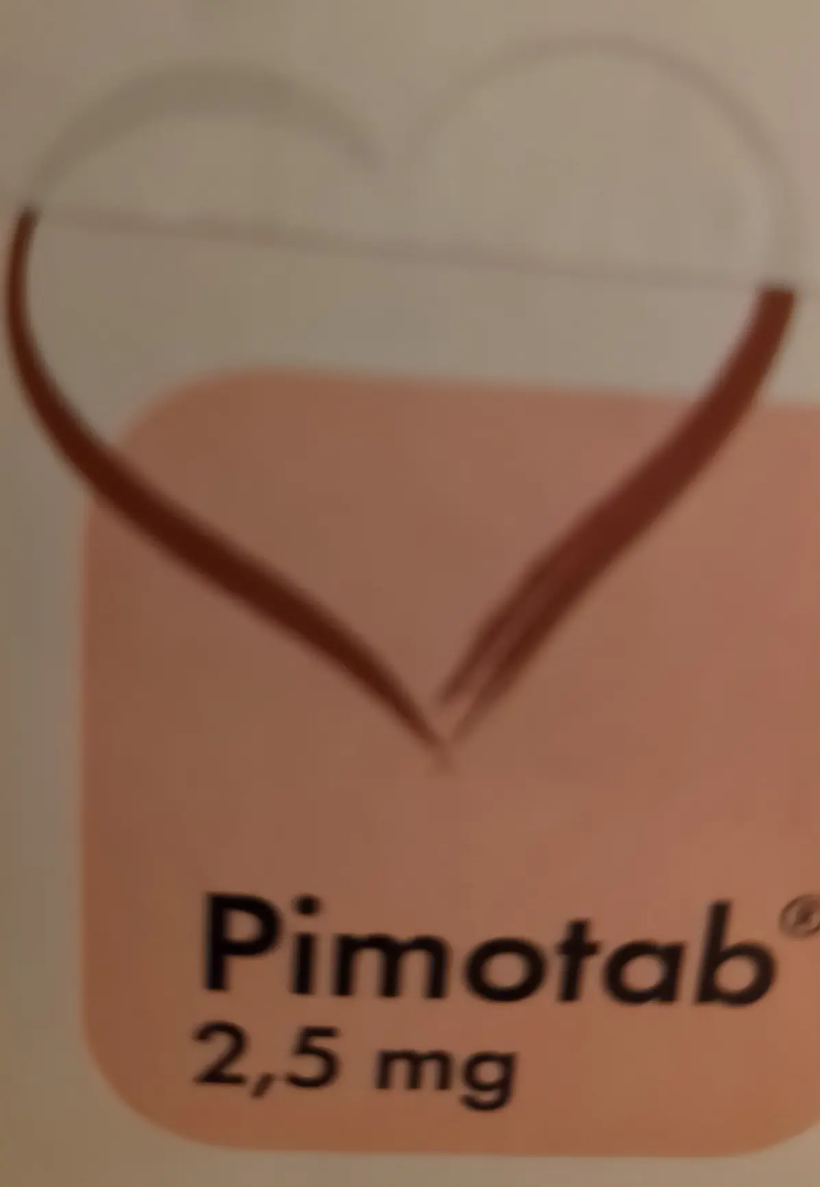 Opakowanie leku dla psa, z biało-czerwonym sercem