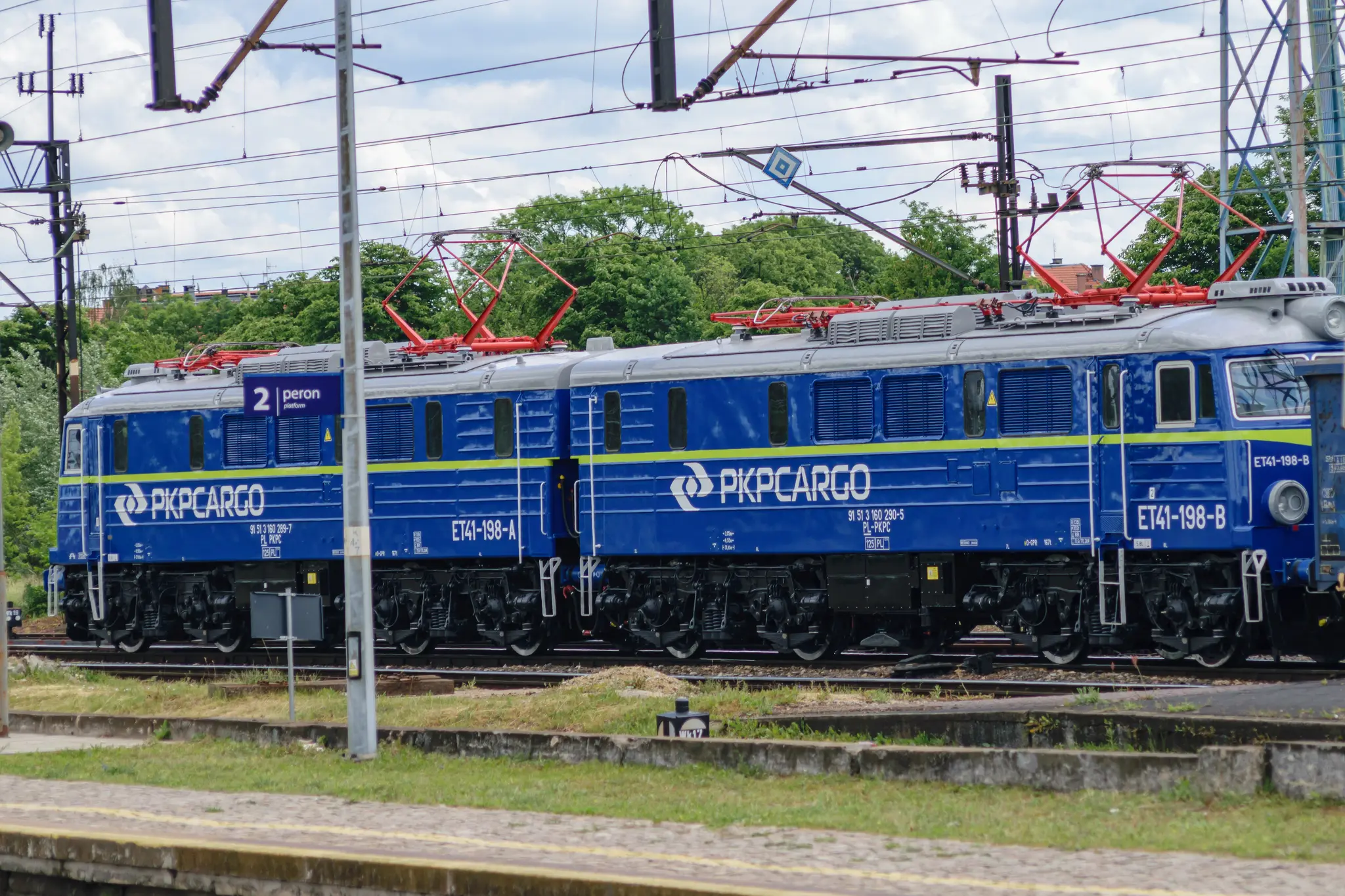 One blue locomotive consisting of two connected cars