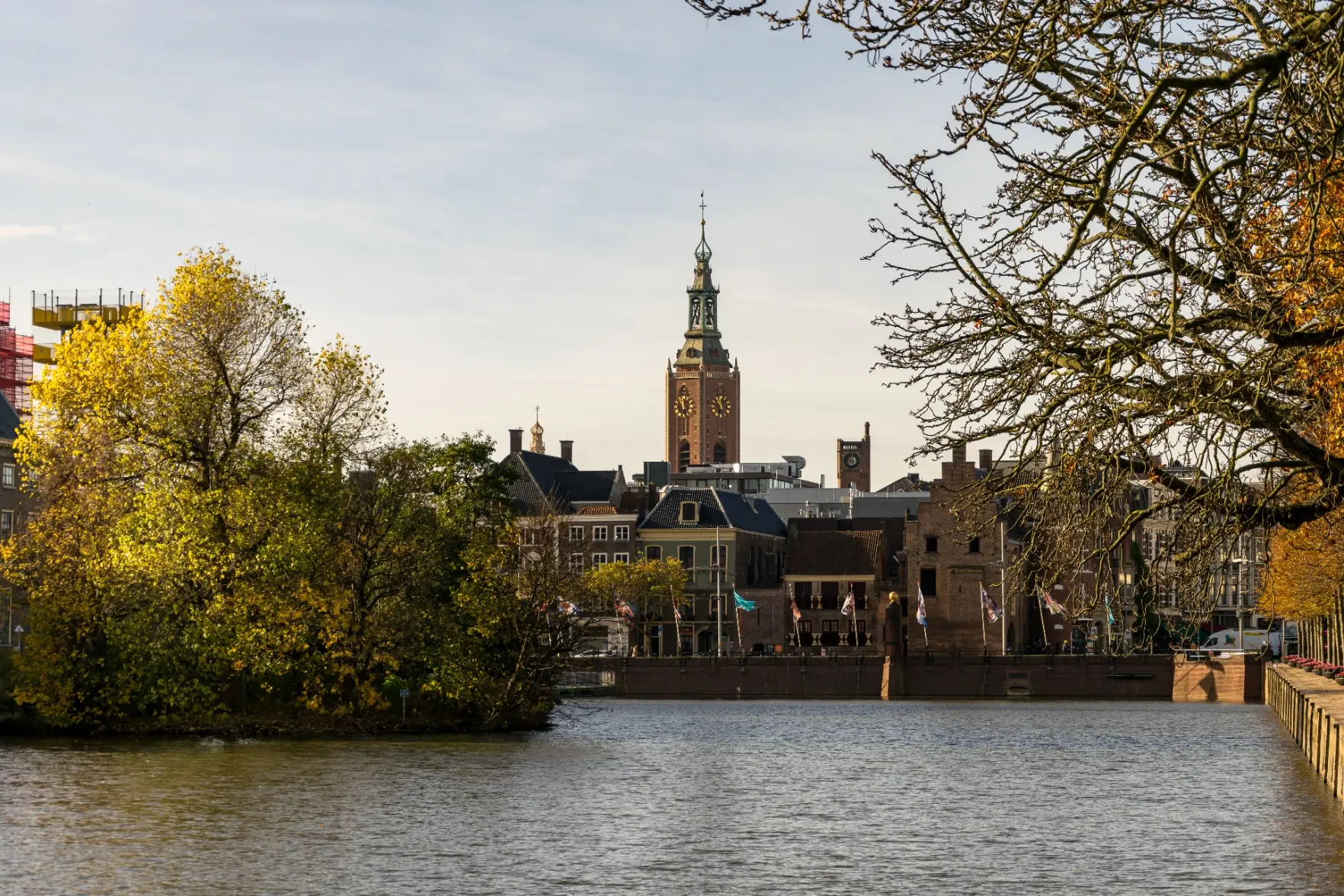 brick buildings with a church tower dominating