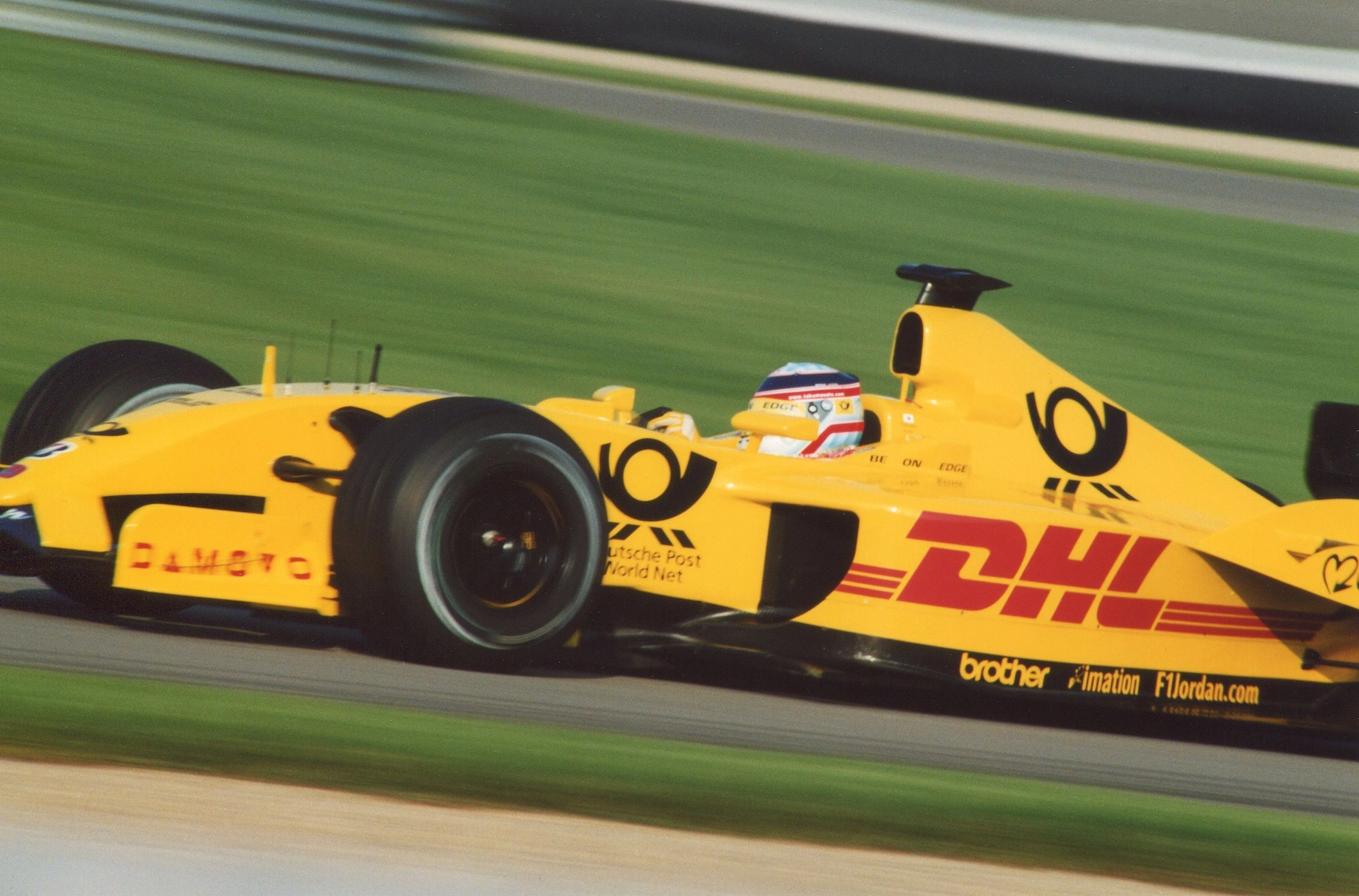 F1 car in yellow DHL livery