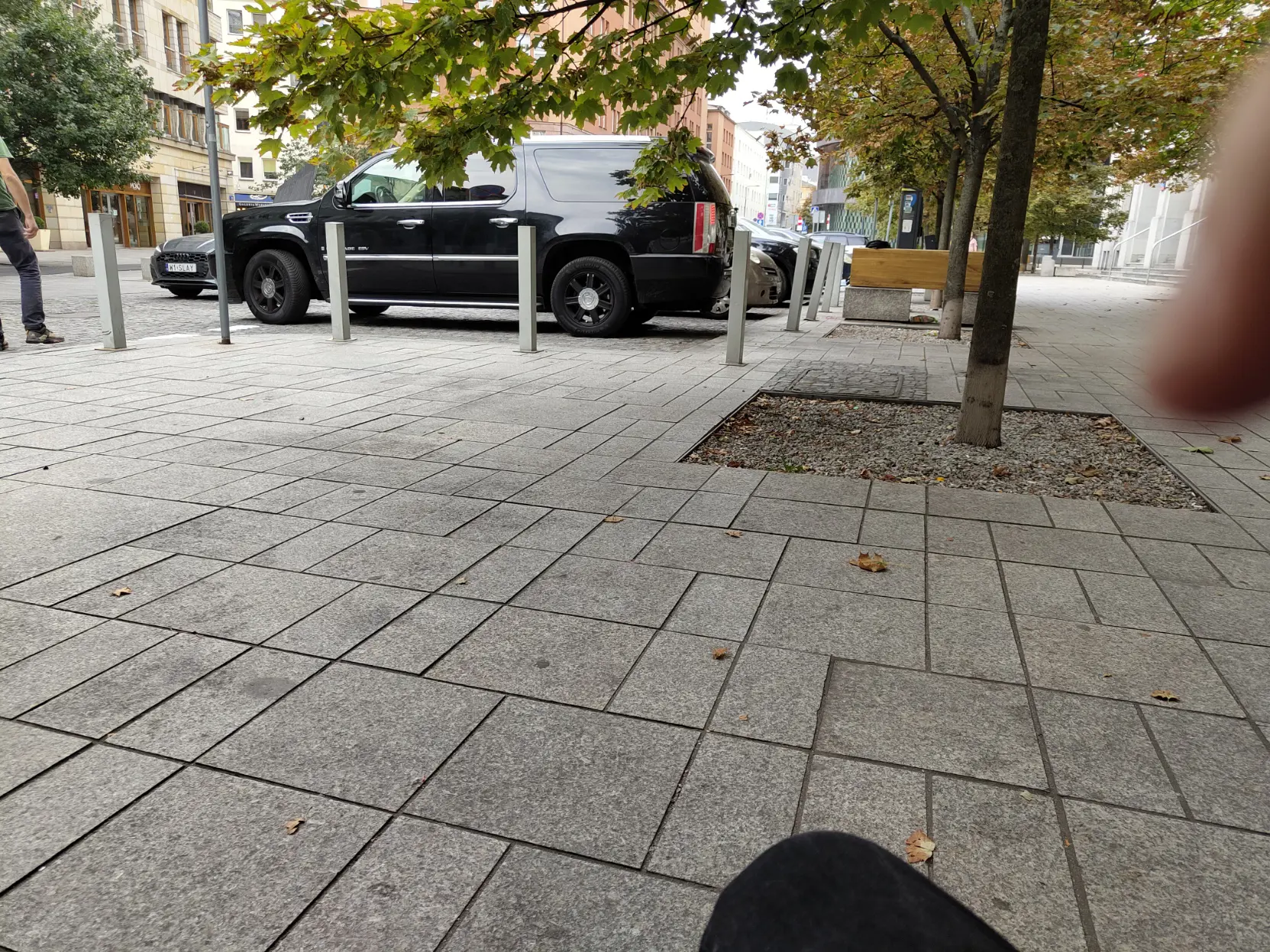 huge ass cadillac escalade trying to park on a narrow street