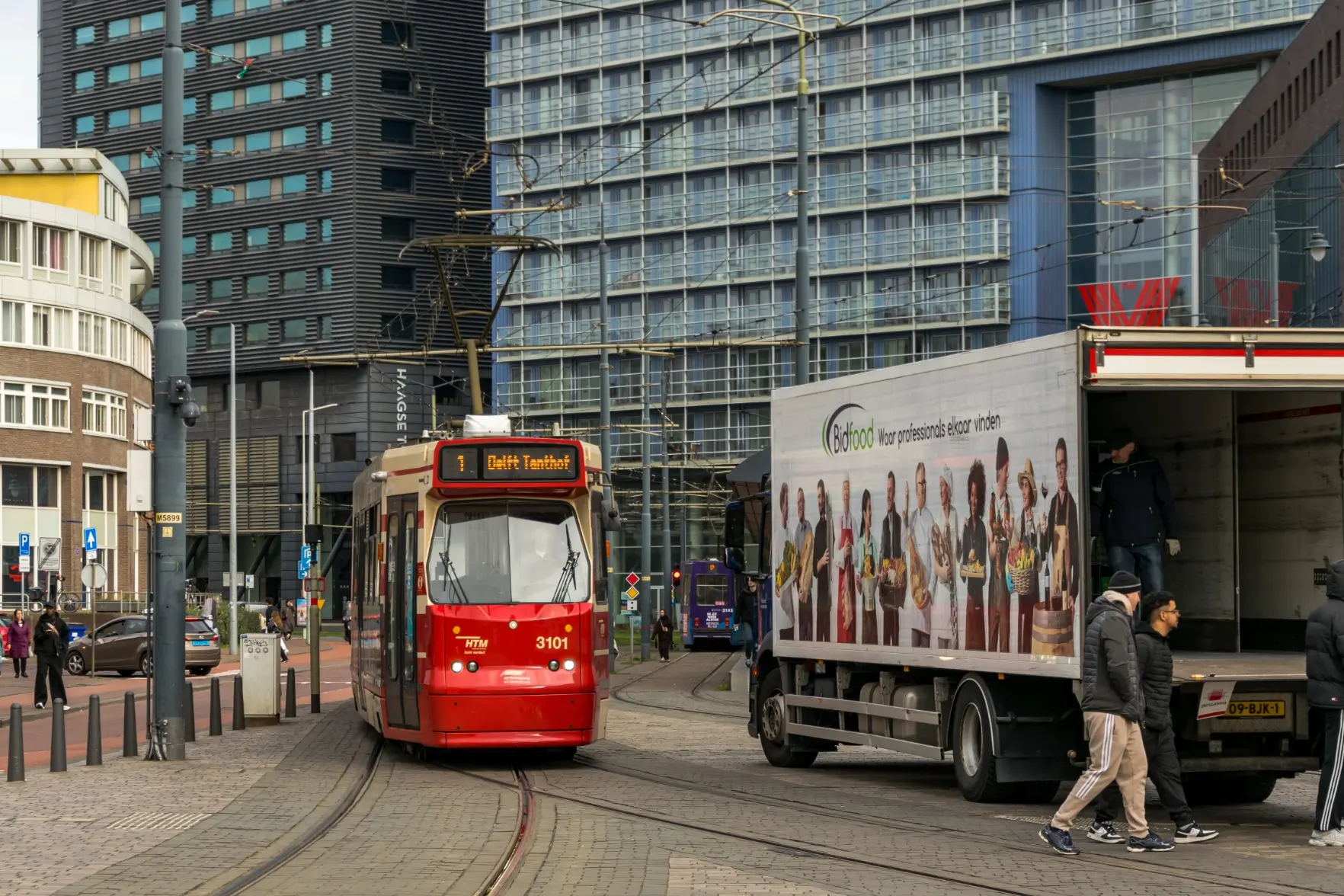 old red tram on a street