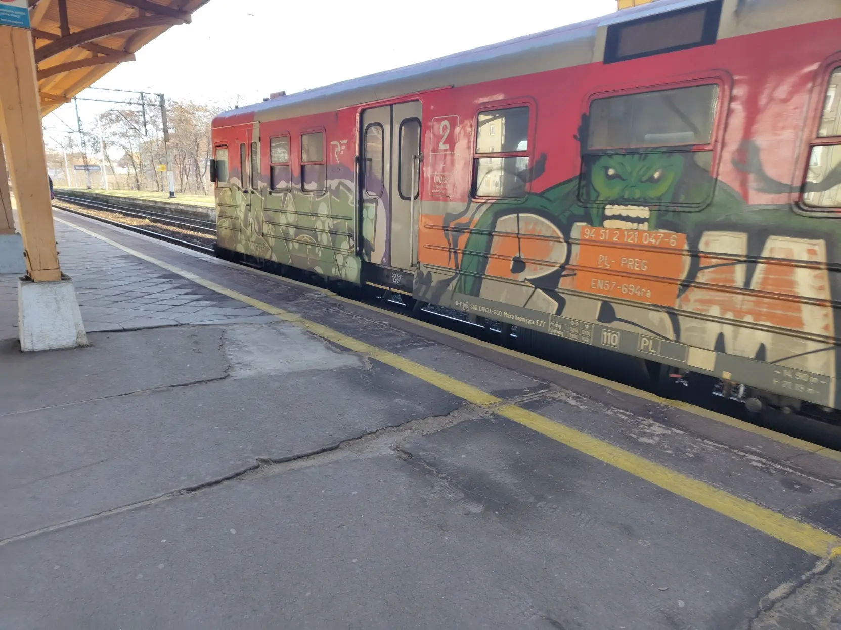 train full of graffiti, with only identification part cleaned