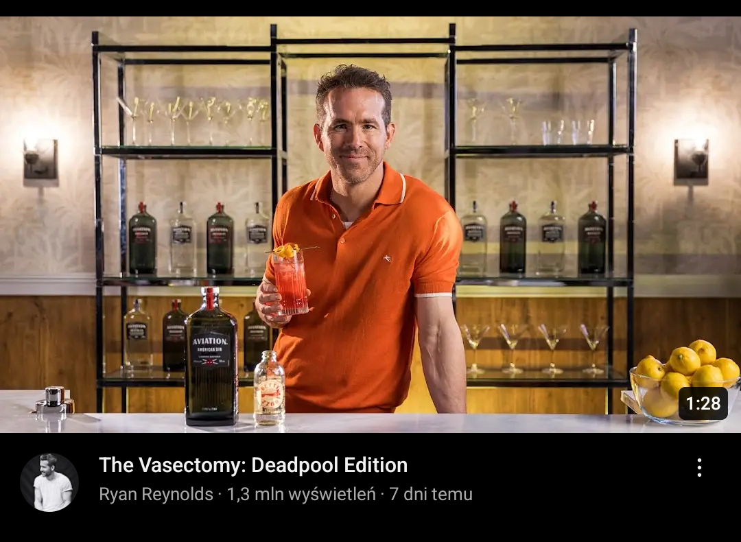 Ryan Reynolds' youtube video called "The Vasectomy: Deadpool Edition", he's holding some alcoholic drink, looking into camera and smiling